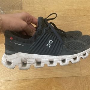 Women’s size 7.5 on running cloud black sneakers